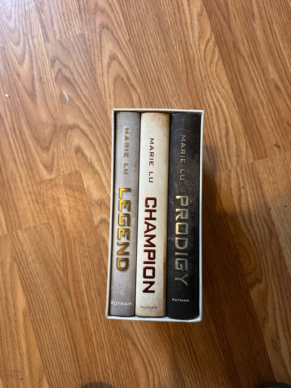 Legend, Champion & Prodigy Box Set - Books by:Marie Lu. Dystopian branded books